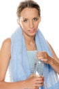 Girl with bottled water Royalty Free Stock Photo