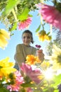 Girl with Bouquet Below View of Flowers In Field Royalty Free Stock Photo