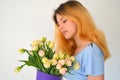 A girl with a bouquet of tulips Royalty Free Stock Photo