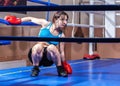 Girl boxer in boxing ring Royalty Free Stock Photo