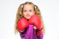 Girl boxer knows how defend herself. Girl child strong with boxing gloves posing on white background. She ready to