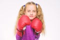 Girl boxer knows how defend herself. Girl child strong with boxing gloves posing on white background. She ready to