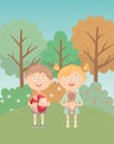 Girl and boy with ball and teddy in the grass park, kids toys Royalty Free Stock Photo