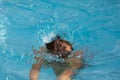 Girl boy child jumping in swimming pool under the water playing having fun in water Royalty Free Stock Photo