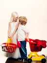 Girl and boy children shopping. Couple kids hold plastic shopping basket toy. Kids store. Mall shopping. Buy with Royalty Free Stock Photo