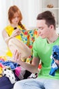 Girl and boy choosing clothes Royalty Free Stock Photo