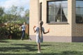 A girl and a boy in a comic battle on water pistols Royalty Free Stock Photo