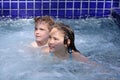 Girl and boy in jacuzzi Royalty Free Stock Photo