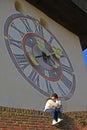 Girl and boy are kissing nearly city clock tower Royalty Free Stock Photo