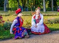 The girl and boy members of the Polish folk dance GAIK in traditional costumes.