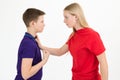 A girl and a boy sort out the relationship with a physical threat, close-up.