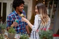 Girl with boy toasting with drink