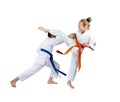 Girl and boy are training attack and defense karate