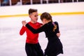 Children-athletes learn pair figure skating. Close up