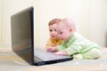 Girl and boy using laptops.Computer generation