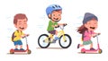 Girl, boys enjoying riding bicycle, kick scooters