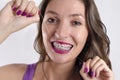 Girl with braces cleaning teeth Royalty Free Stock Photo