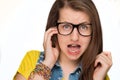 Girl in braces wearing geek glasses isolated Royalty Free Stock Photo