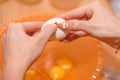 The girl breaks the egg. Cooking homemade food. Eggs for the test. Cooking dough. Natural food. Home cooking Royalty Free Stock Photo