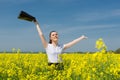 Girl with briefcase on yellow flower field Royalty Free Stock Photo