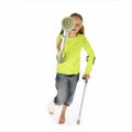 Girl with a broken leg walking on crutches Royalty Free Stock Photo