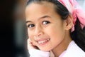 A girl with brown eyes and pink bandanna Royalty Free Stock Photo