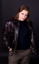 Girl in a brown leather jacket Royalty Free Stock Photo