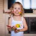 Girl with brush paints