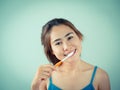 Beautiful girl brushing her teeth Royalty Free Stock Photo