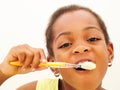 Girl brushing teeth