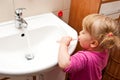 Girl brushing teeth