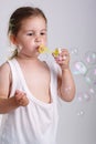 Girl with bubble blower Royalty Free Stock Photo