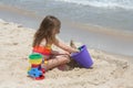Girl building sand castle 3 Royalty Free Stock Photo