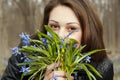 A girl with bunch of bluebells Royalty Free Stock Photo