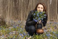 A girl with bunch of bluebells Royalty Free Stock Photo