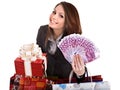 Girl in business suit with money, gift box, bag.