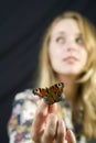 Girl and buterfly Royalty Free Stock Photo