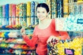 Girl buying candies at shop Royalty Free Stock Photo