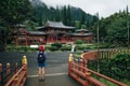 girl in Byodo-in Buddhist Temple, island Oahu, Hawaii.