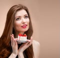 Girl with the cake looking up Royalty Free Stock Photo