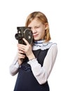 Girl cameraman filming with retro camera Royalty Free Stock Photo