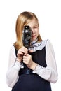 Girl cameraman filming with retro camera Royalty Free Stock Photo