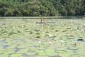 Girl on canoe at isla de las flores on river Dulce