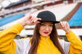 Girl in a cap at an empty stadium Royalty Free Stock Photo