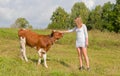 Girl caresses bull