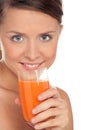 Girl with carrot juice Royalty Free Stock Photo