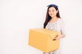Girl carry box to new house Royalty Free Stock Photo