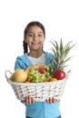 girl carrying a fruit basket Royalty Free Stock Photo