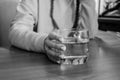 A girl carrying a glass of water. Clean water in the glass. Minsk, Belarus