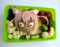 The girl a cat is made of rice. Kyaraben, bento